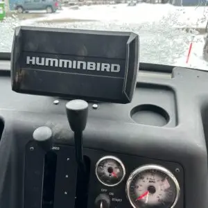 A close up of the dashboard of a humminbird vehicle